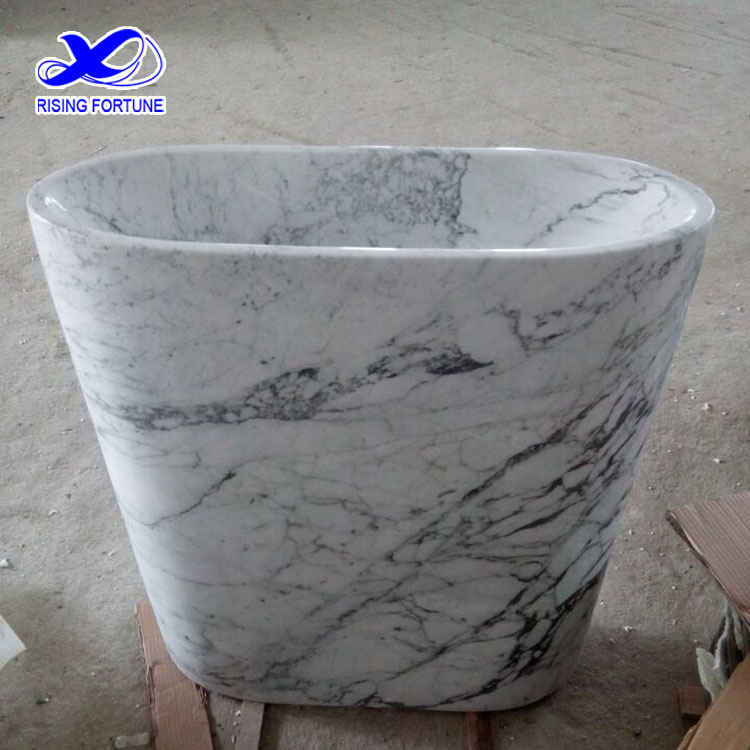 white marble pedestal basin