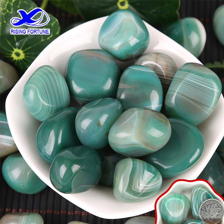 green polished pebbles river stones