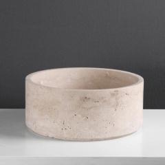 beige travertine dog bowl